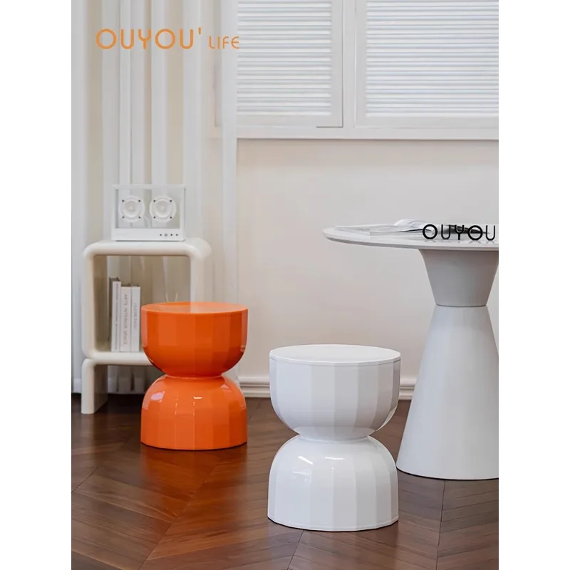 

Creative hourglass low stool simple home door shoe changing stool Internet celebrity living room bedroom plastic