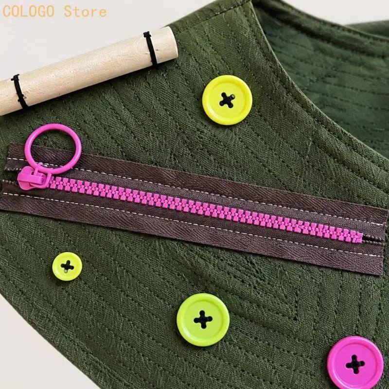 Green Bird Activity Drape with Two Shoulder-Mounted Rails, Colorful Hanging Pieces, Front Storage Compartment and Cords Beneath