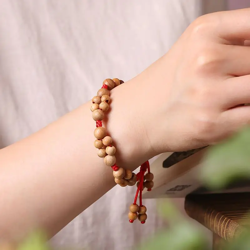 Handcrafted Decade-Aged Natural Peach Wood Bracelet with Plum Blossom Design for Women Protective Fortune Cultural Heritage Gift