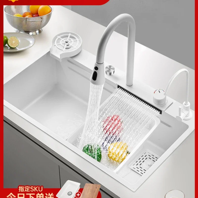 

Household kitchen stainless steel sink with white cream.