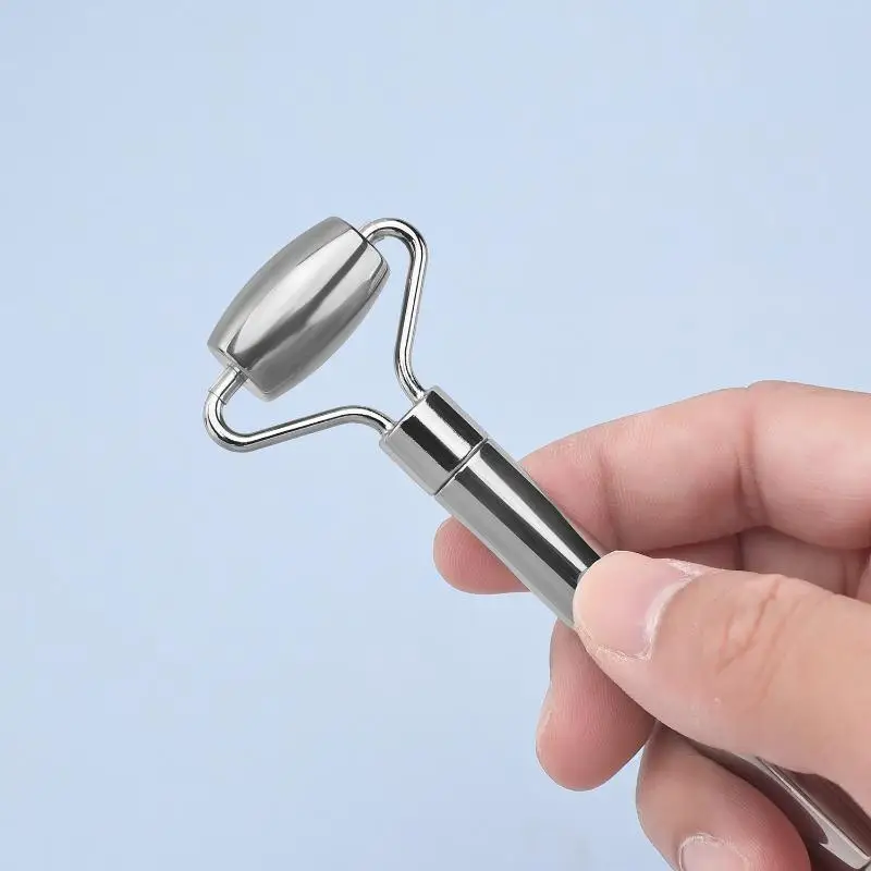Rullo per massaggio per la cura della bellezza del viso per il rafforzamento della pelle in acciaio inossidabile Rullo per il viso Gua Sha Strumento per massaggio del collo del viso di bellezza