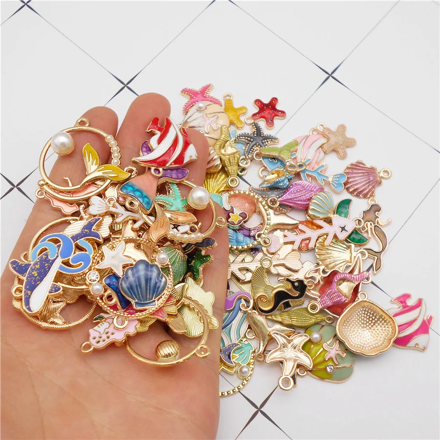 Julie Wang 50PCS Enamel Marine Life Charms Mixed Alloy Fish Shell Whale Seahorse Mermaid Sea Animal Jewelry Making Accessory