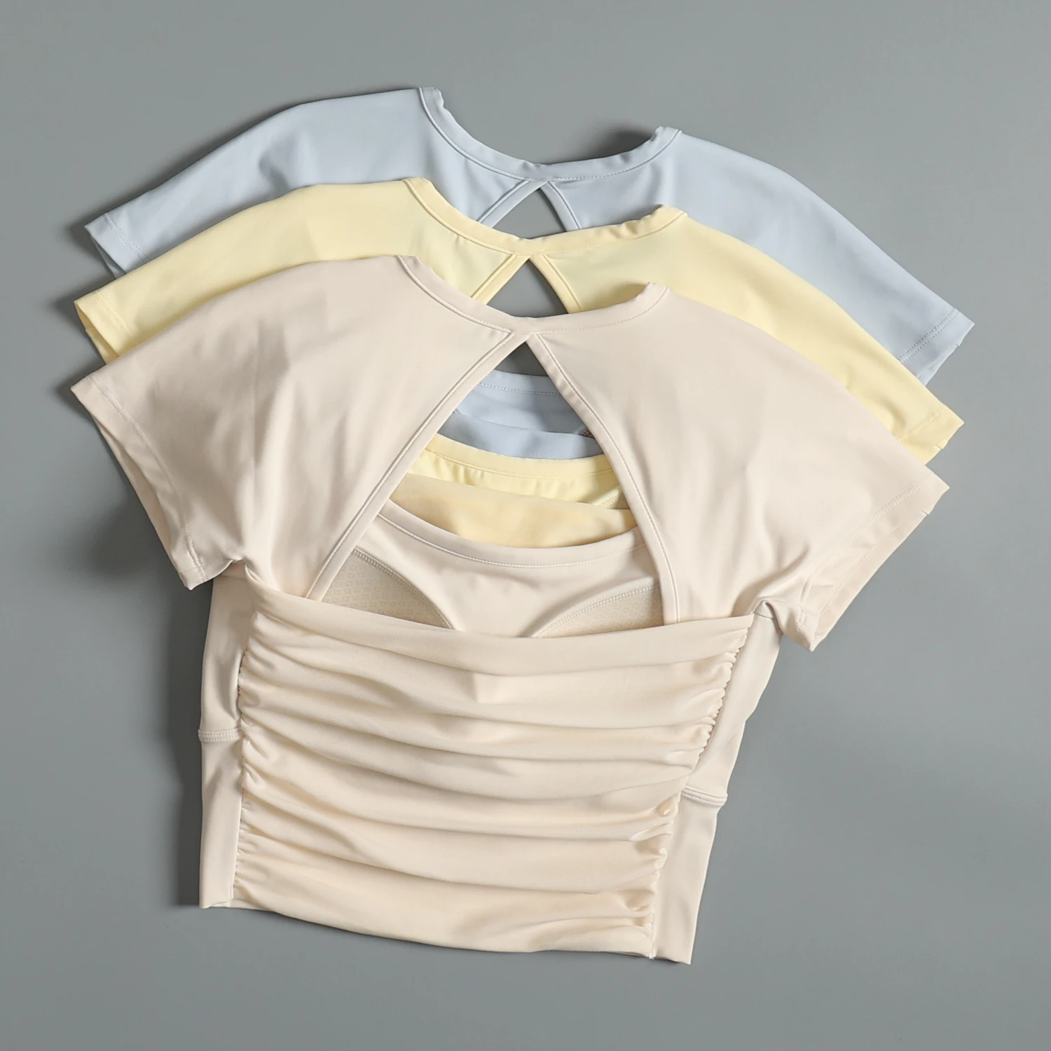 

Sexy hollow yoga suit beautiful back short sleeves with chest pad sports body suit mesh breathable running speed dry suit