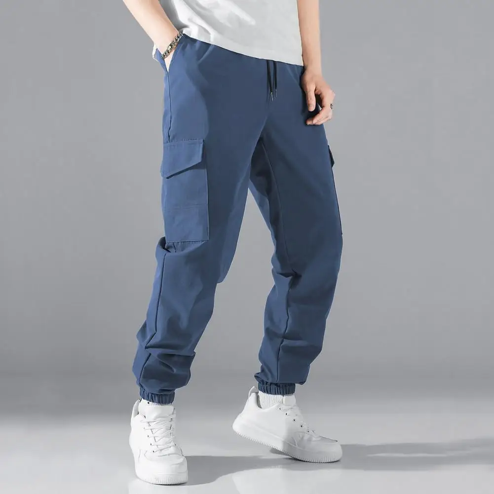 Calça masculina com cordão cargueiro, elástico na cintura, bolsos múltiplos, com faixas no tornozelo, ajuste solto, esporte diário, calças ao ar livre