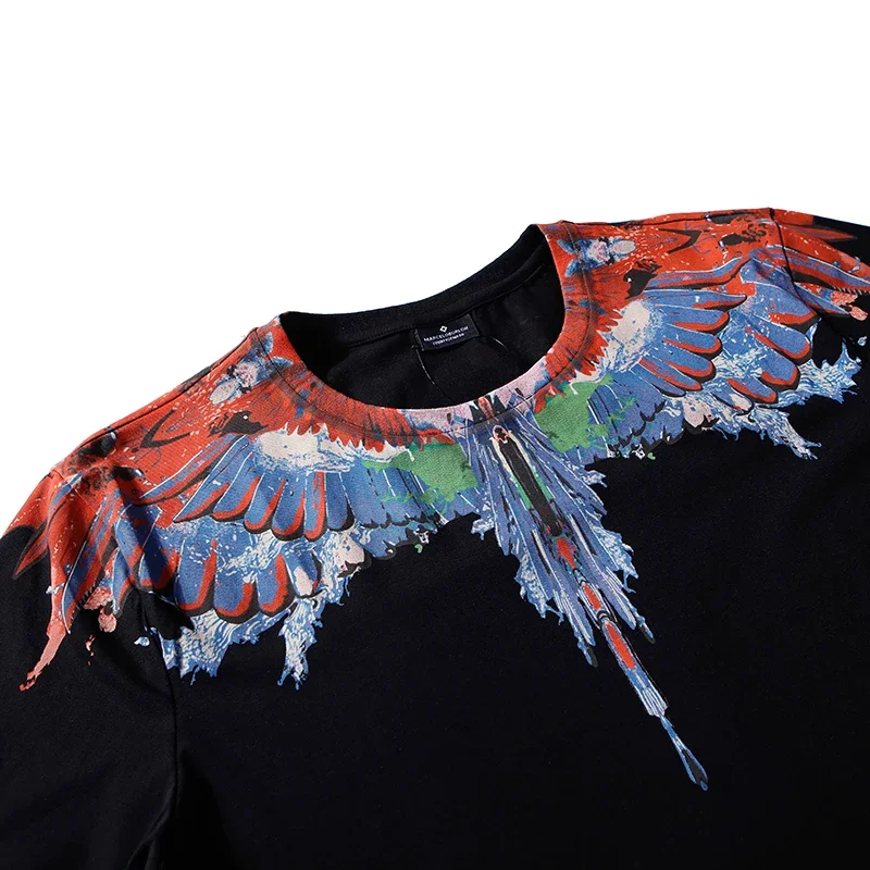 الأصلي الرجال النساء التجفيف السريع تي شيرت MARCELO BURLON MB العلامة التجارية أجنحة طباعة تي شيرت الرياضة عادية Y2K الشارع قصيرة الأكمام