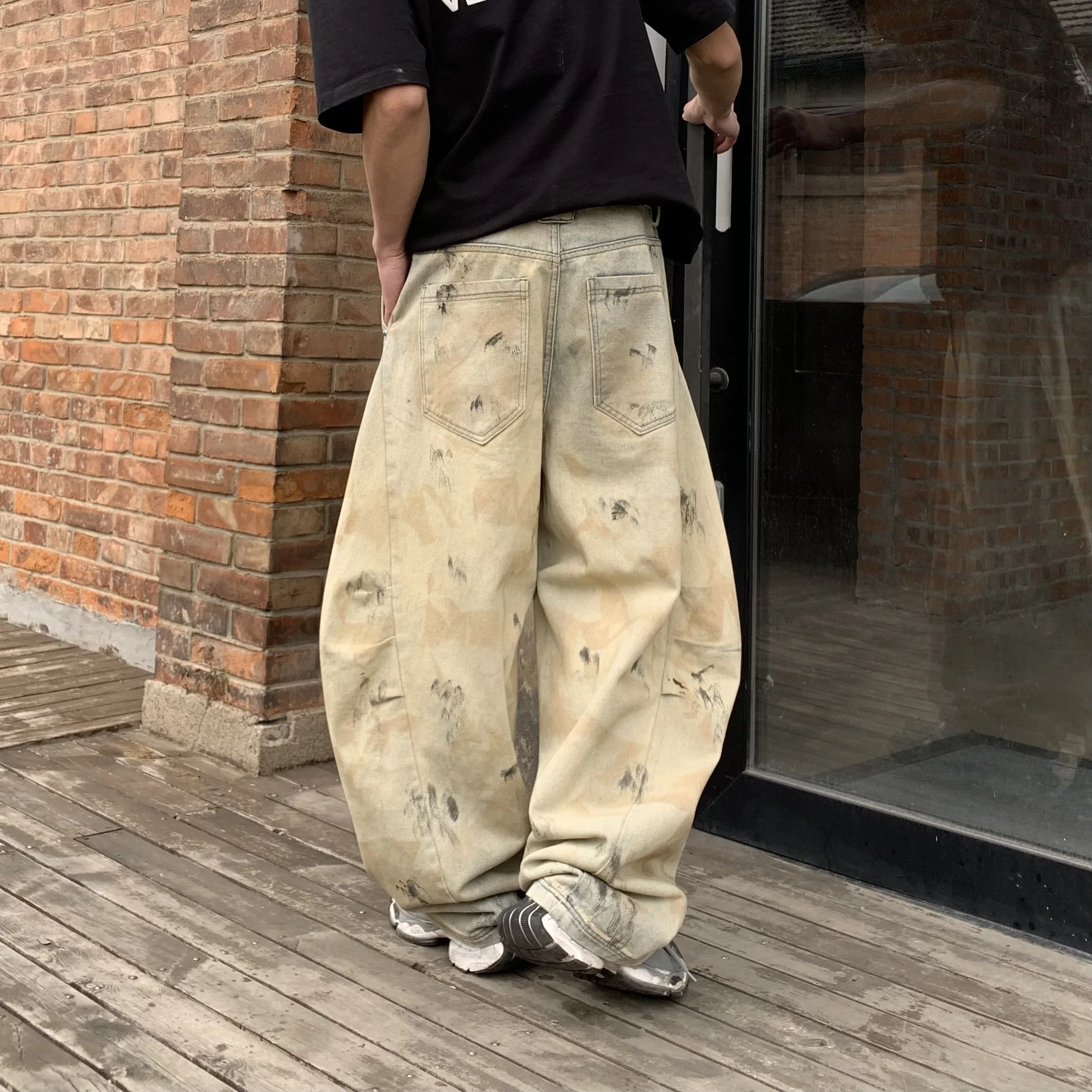 2025 nuevos pantalones vaqueros desgastados lavados para hombres, moda Retro americana, pantalones holgados de pierna ancha con dobladillo curvo, pantalones de diseño industrial pesado para mí