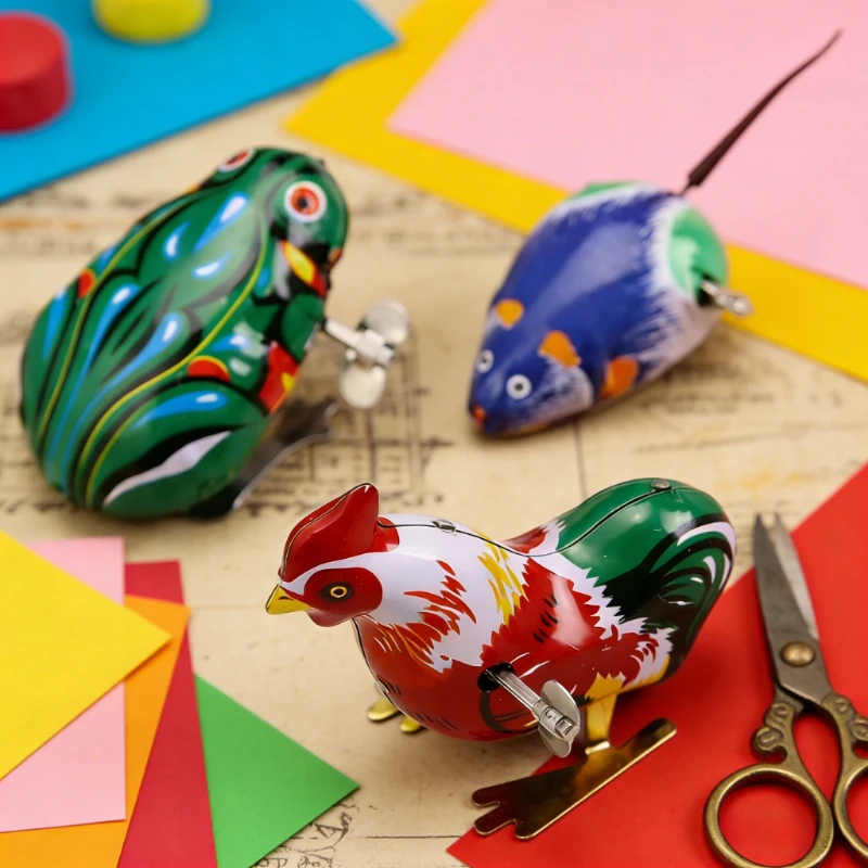 

Игрушки на пружинке: жаба, кролик, мышь, рыба из жести. Детские игровые призы и подарки TMZ