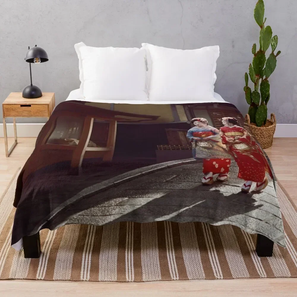 Two Geisha apprentices Maiko in bright kimono walking down an old street in Kyoto Japan art photo print Throw Blanket