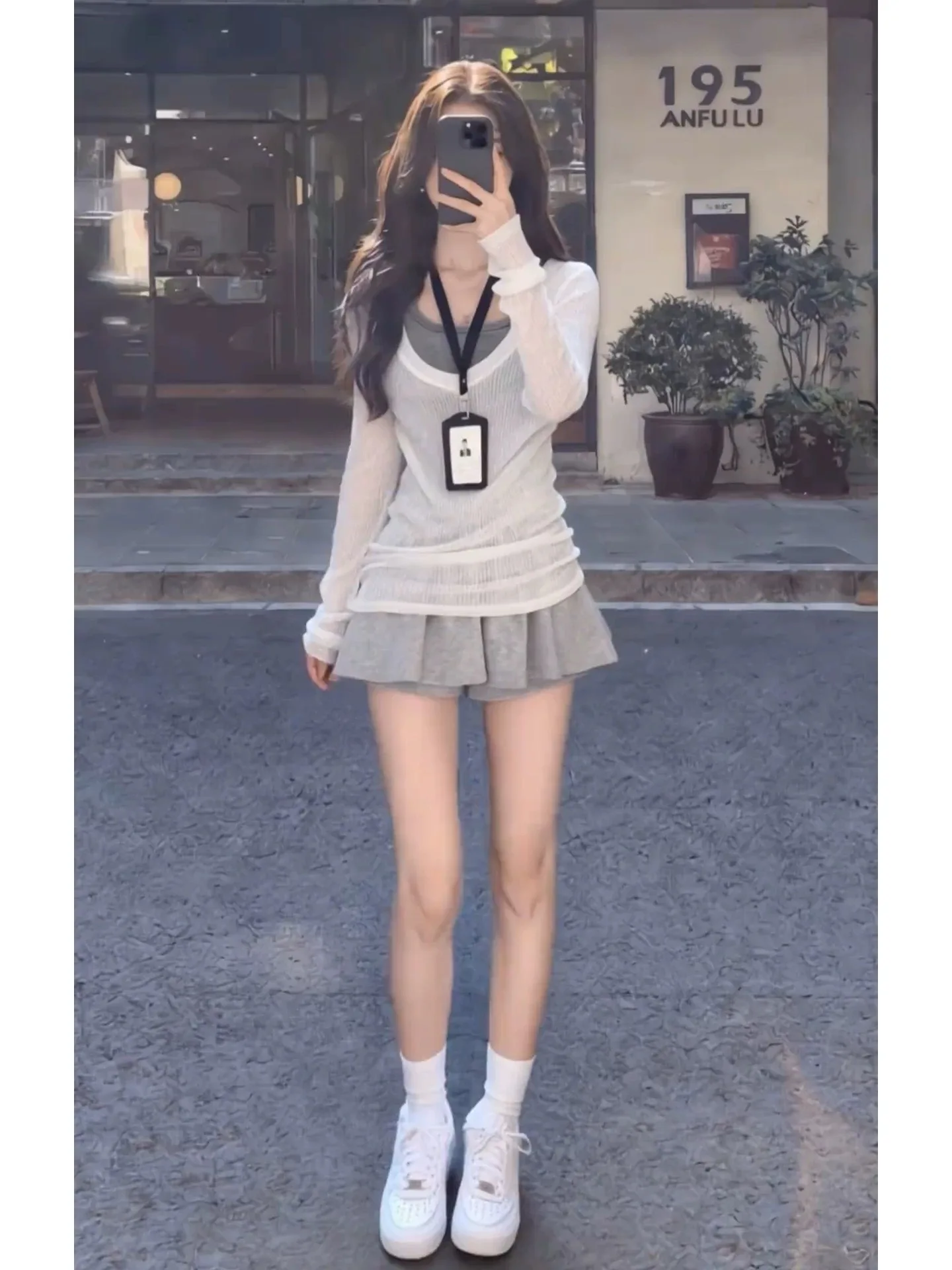 

Summer 2026 Women's White Strap Short Skirt Set Waist-Cinching Fashionable Three-piece V-neck Long-sleeve Casual Wear