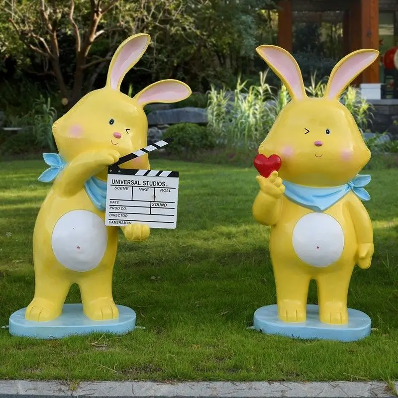 

Outdoor cartoon animal rabbit sculpture kindergarten shopping mall Meichen Internet celebrity clock in photo seat FRP ornament