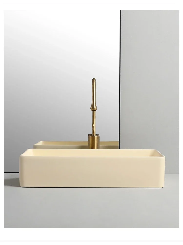 Bathroom cream-colored ceramic wash basin, sink rectangular table on the basin, home balcony wash sink tools home decoration