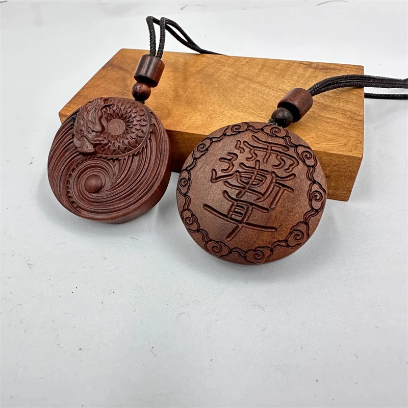 

Taoist supplies, double-sided handmade precision carving, lightning struck jujube wood, purple Wei taboo, Tai Chi pendant