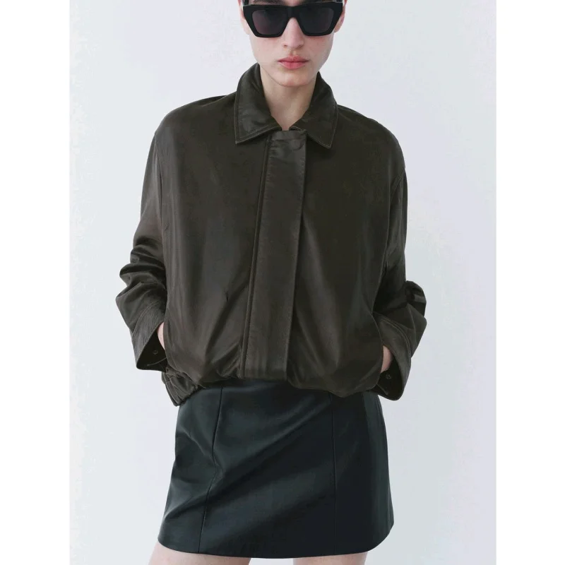 Gonna ort in pelle PU di design estivo da donna Decorazione linea di cucito Gonna in pelle semplice ed eleganza Fibra di poliestere casual