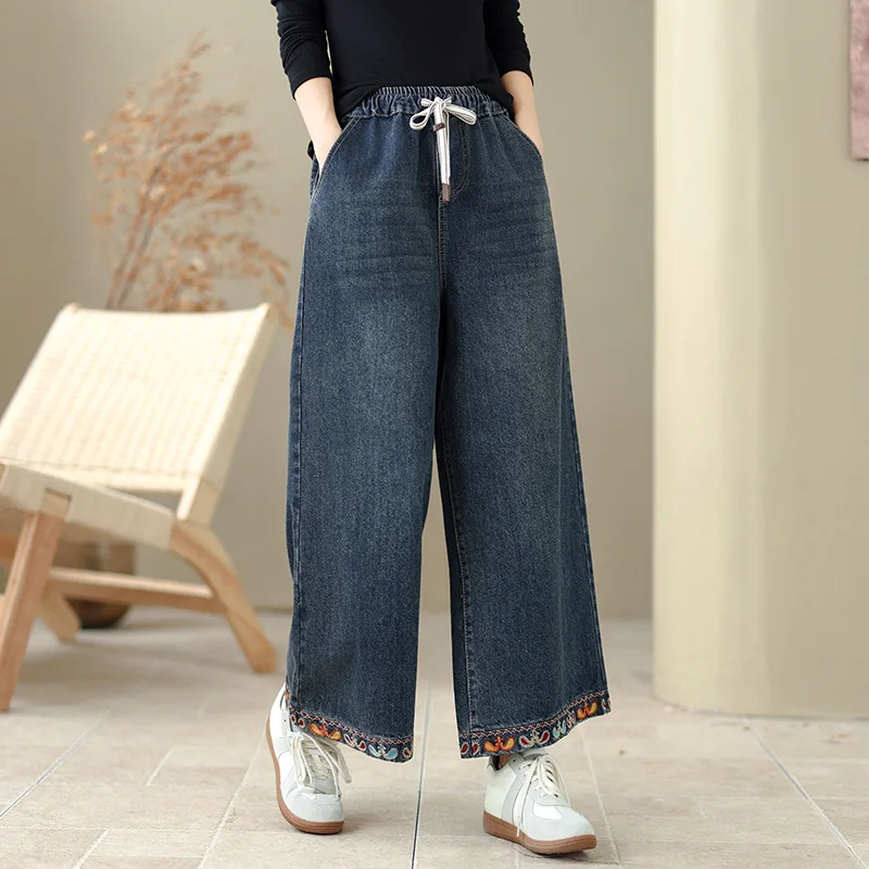Hoge kwaliteit dames denim broek herfst en winter 2026 etnische stijl bloem geborduurde denim wijde pijpen broek gezellige broek