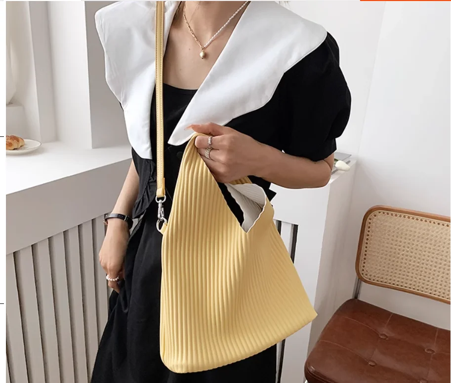 IN STOCK Miyake High-end pleated twilight One shoulder solid veiled button PU bag pleated bag HOT SELLING