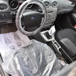 25 disposable car dust covers including steering wheel, handbrake, seats, gear lever, and foot pads