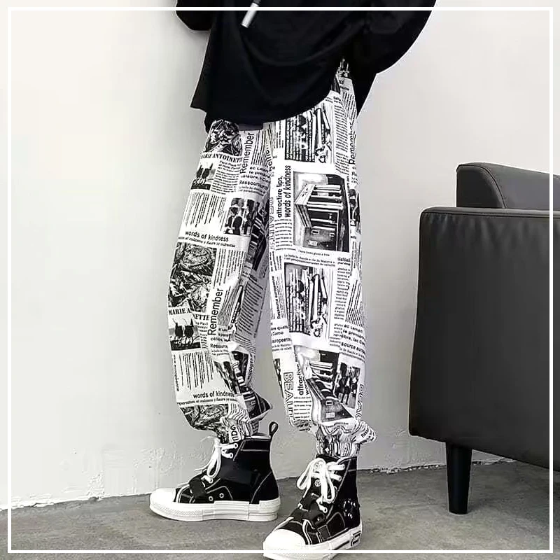 

2024 Four Seasons Street Dance Hip Hop Style Newspaper Graffiti Print Personalized Trend Fashion Versatile Strap Casual Pants