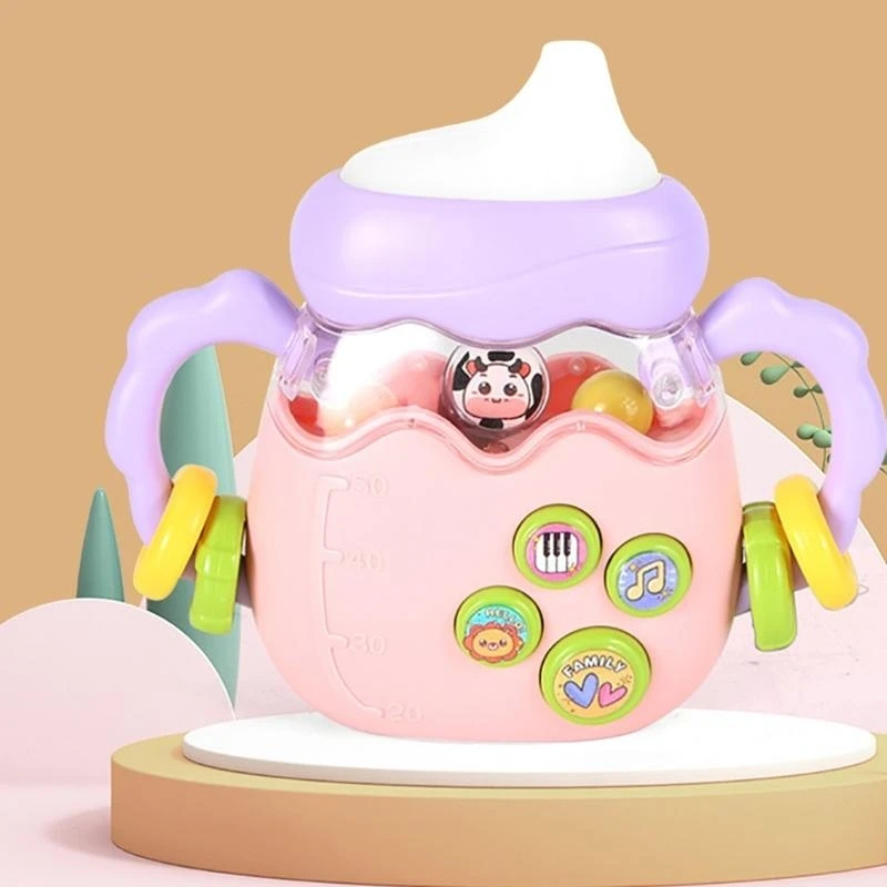 لعبة خشخيشة موسيقية لزجاجة الأطفال مع لعبة تعليمية لأجراس اليد الكهربائية ذات الموسيقى الخفيفة