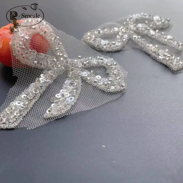 20 sztuk/partia. Srebrna mała kokardka, 7*7cm, aplikacja z koronki z koralikami, DIY, Haute Couture, akcesoria do sukni ślubnej, RS24487