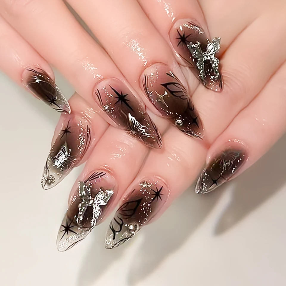 24 piezas uñas postizas largas stiletto negras con moño plateado asimétrico, set de uñas con polvo