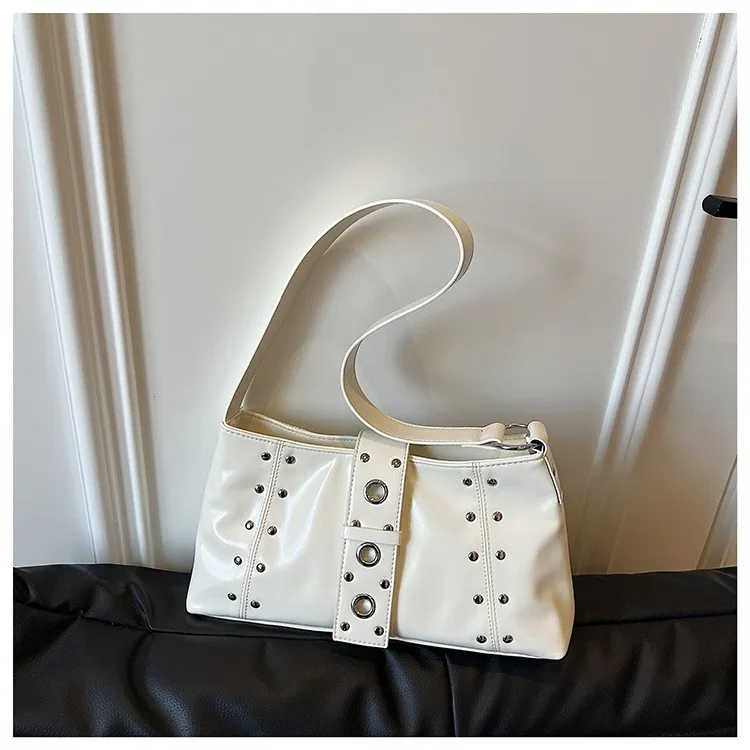 

Large capacity bag women's summer 2025 new niche design fashion rivet bag Korean version single shoulder armpit small square bag