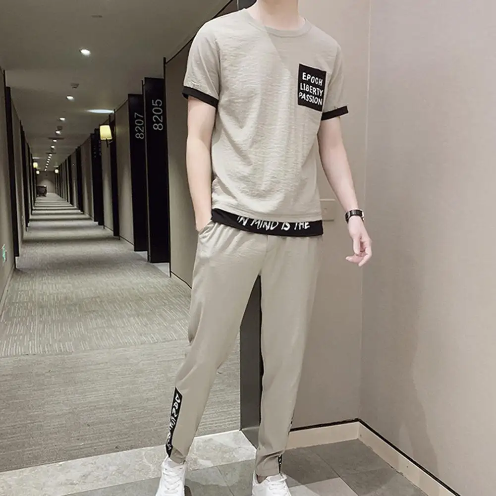 

Simple Men Outfit Round Neck Male Crew Neck Top Drawstring Pants Sportswear Set Men Top Pants 1 Set