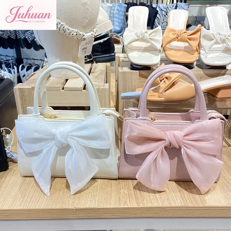 

Japanese original new glossy messenger ribbon bow ins girl sweet and cute versatile vertical square portable tote bags women