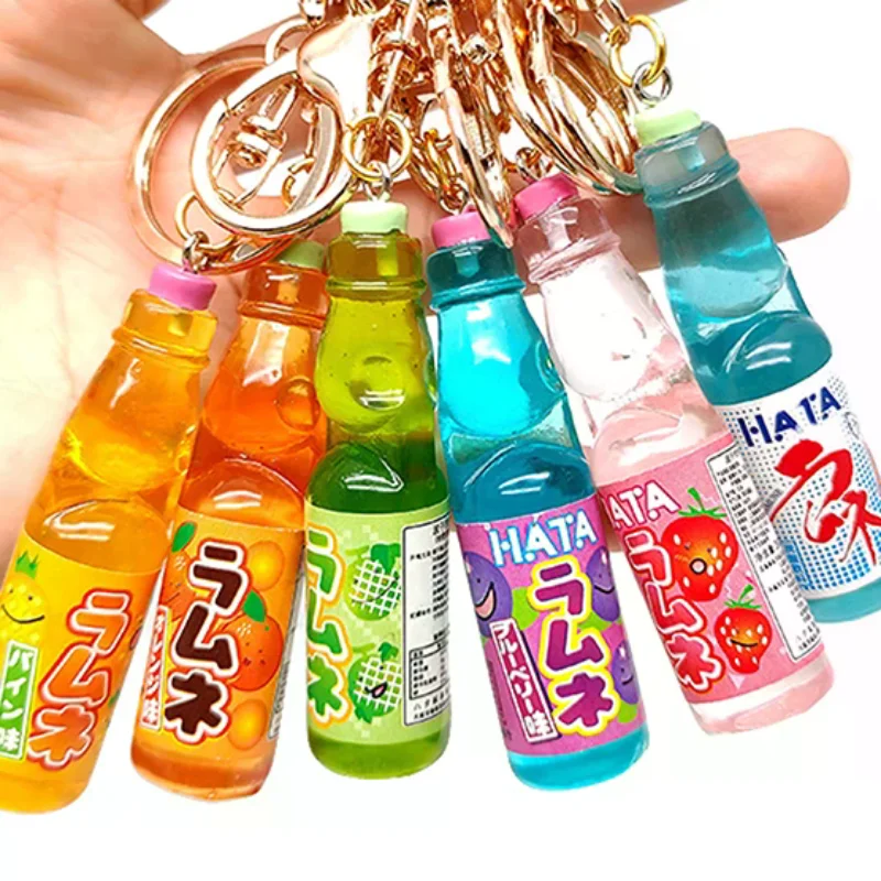 1 pieza lindo creativo miniatura bebida de Soda encanto Mini adorno para casa de muñecas simulación de canicas japonesas Bobble Soda llavero