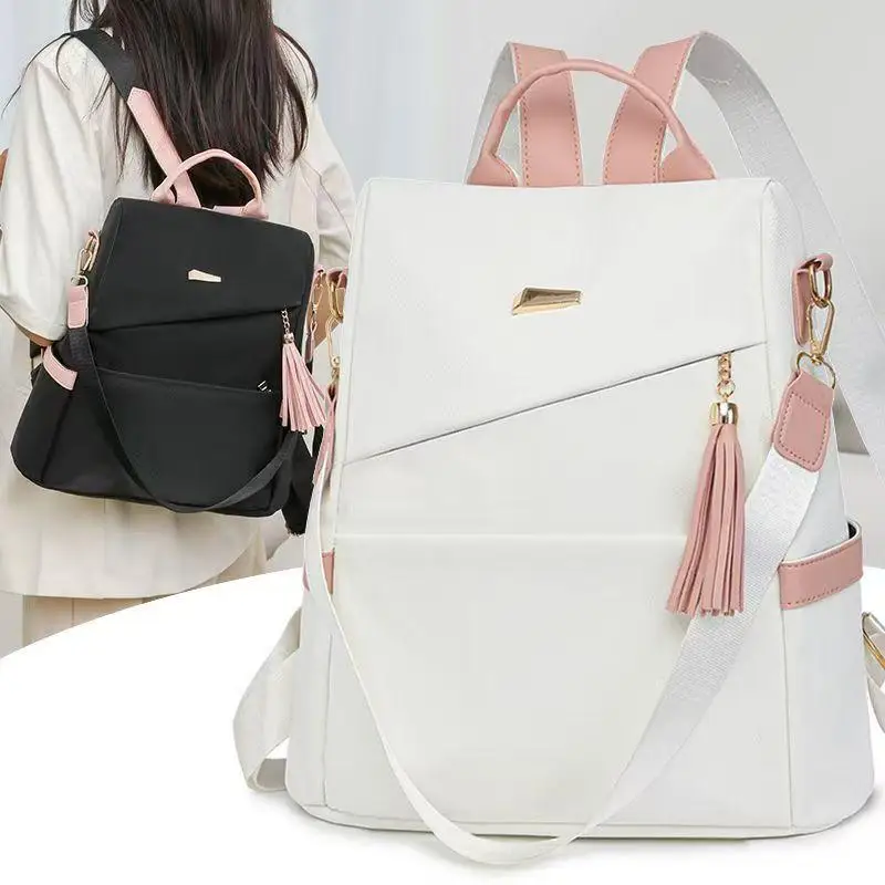 حقيبة ظهر نسائية من قماش أكسفورد على الموضة لعام 2025 مضادة للسرقة وسحاب خلفي بسعة كبيرة حقيبة سفر غير رسمية بكتف مزدوج حقيبة طالب