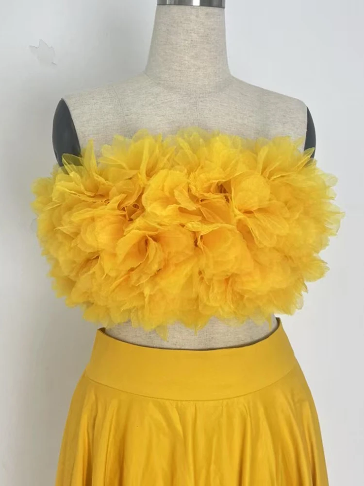 In de zomer van 2025, het nieuwe damespak met driedimensionale bloem elastische sexy tube top en hoge taille A-vormige rok se