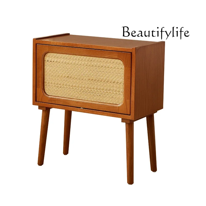 

Rotating bedside table retro solid wood dresser rattan dresser integrated bedside locker