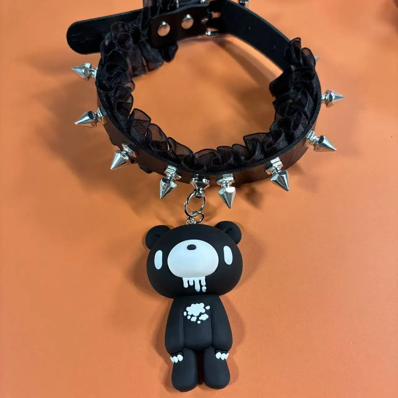 Edgy Bloody Bear Choker Necklaces - Cute yet dark bear pendants with spiked, ruffled collars. Bold alternative style.