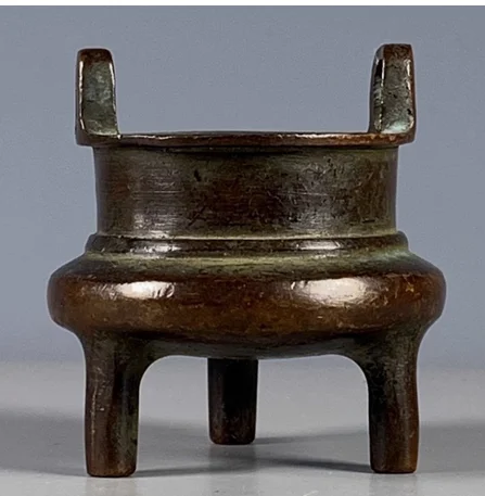 

Three legged tripod with double ears imitating purple copper incense burner double ears imitating purple copper from Dynasty ant