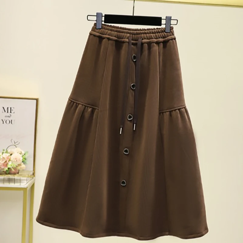 تنورة نسائية بلون سادة بتصميم بسيط للترفيه اليومي تنانير على شكل حرف a لشتاء 2025 تنورة عصرية عالية الخصر #2