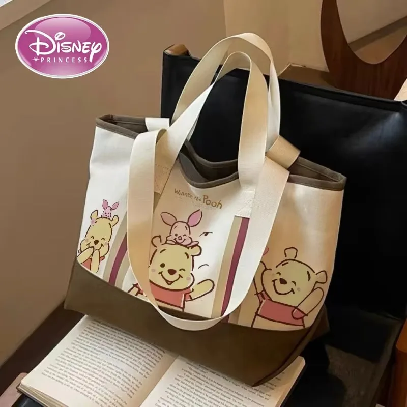 

Disney New Cartoon Winnie Bear Print Casual Commuter Tote Bag Fashionable Versatile Large Capacity Single-shoulder Class Bag