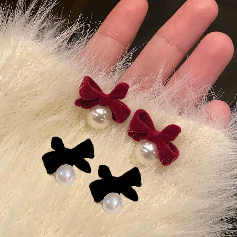 Francese retrò Bowknot ragazza orecchio Stud 2024 nuova moda floccaggio papillon orecchini pendenti di perle fiocco di velluto gioielli orecchino di capodanno