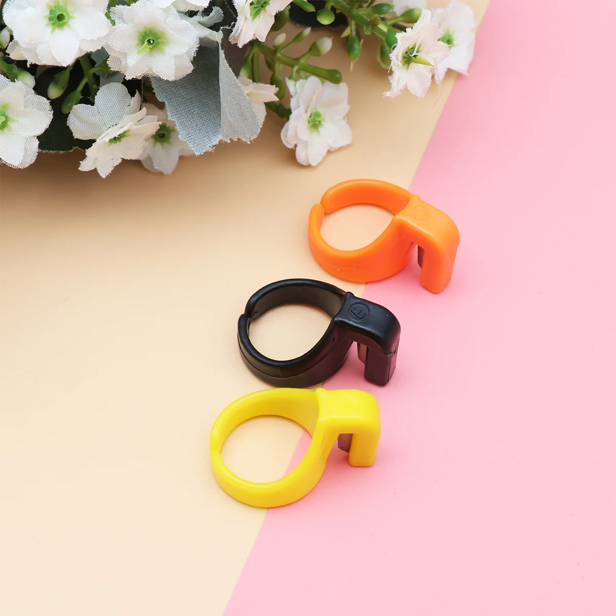 Anneau de coupe de fil à coudre ABS en acier inoxydable de qualité supérieure, outil de doigt multifonctionnel pour la coupe à la maison et à l'extérieur Orange 10 pièces