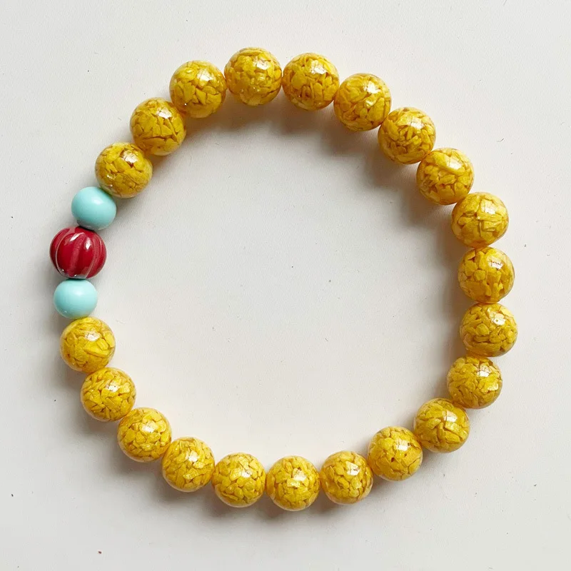 

Женщины из натурального желтого золота с тыквенными бусинами, браслет мира и бирюзой
