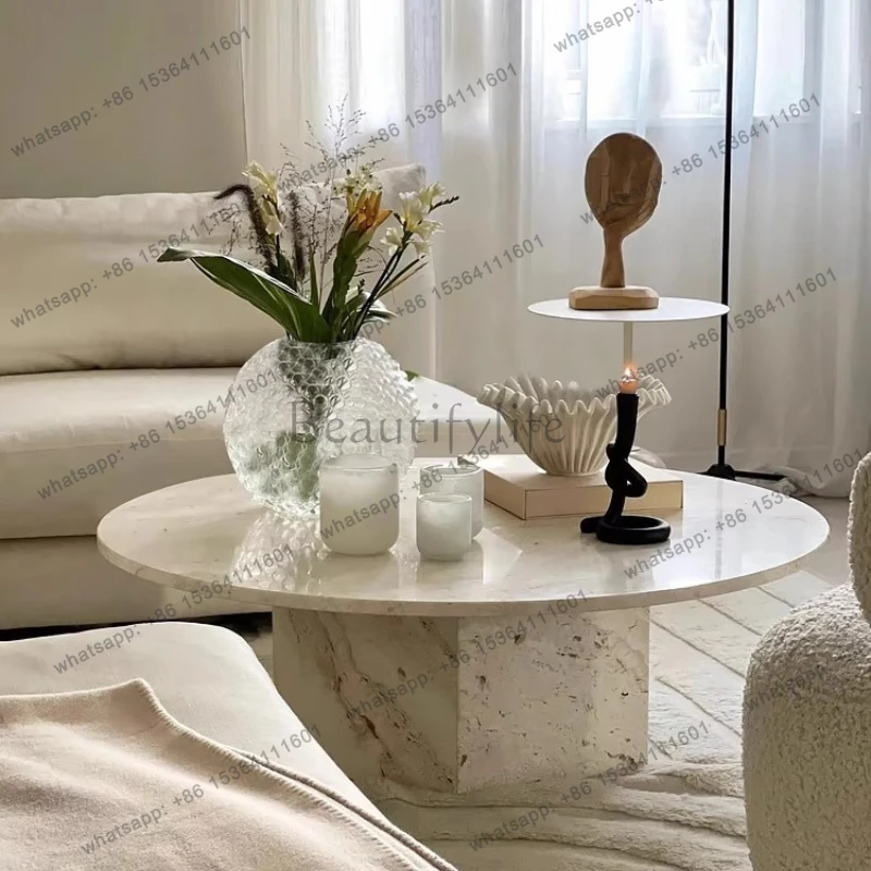 

Cream style natural marble coffee table Internet celebrity cave stone edge table living room French round coffee table