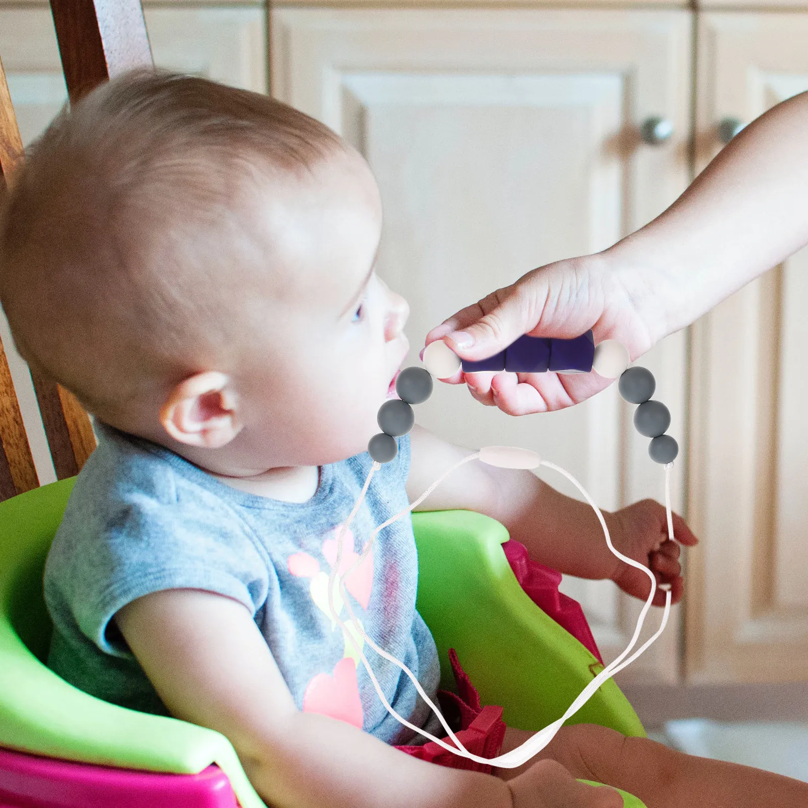 

Infant Teether Necklace Coil Design for Mouth Lips Tongue Touch Safe Non-Toxic Teething Aid Baby Teething Toy