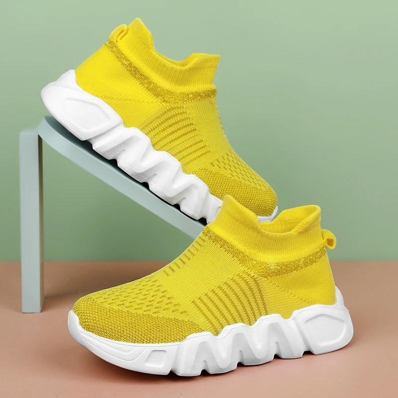 A pair of children's lightweight stretch knit sports trainers, hollow mesh upper, flexible non-slip outdoor sneakers JJ-YK630