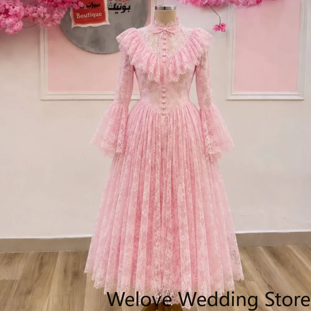 

Pink Romantic Vintage‑Style Lace Midi Dress with High Neck Bow Detail Button‑Front Bodice, Long Flared Bell Sleeves