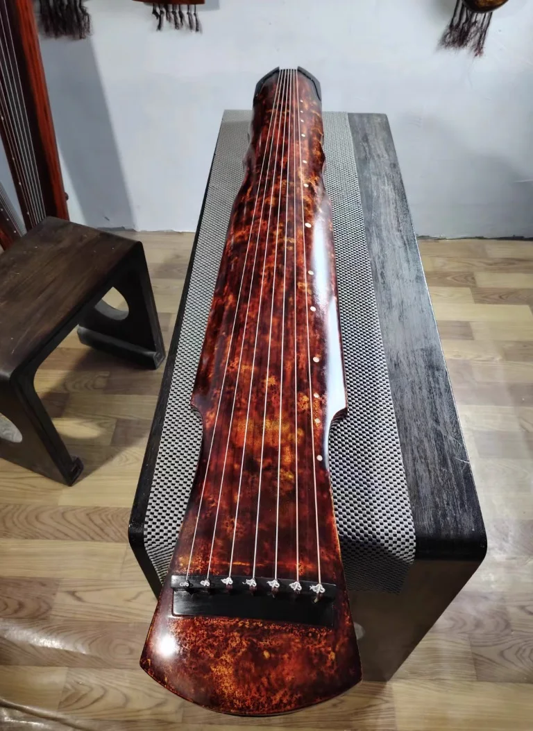 

Guqin red-gold Fuxi style Professional performance Chinese string instruments