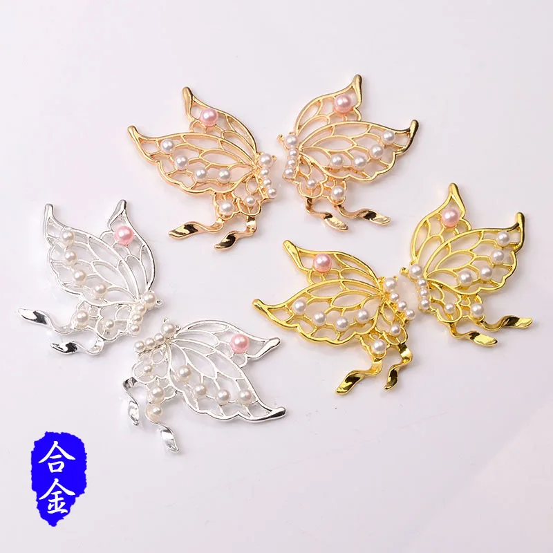 Handmade DIY alloy symmetrical butterfly accessories retro large hollow pearl butterfly brooch material jewelry wholesale