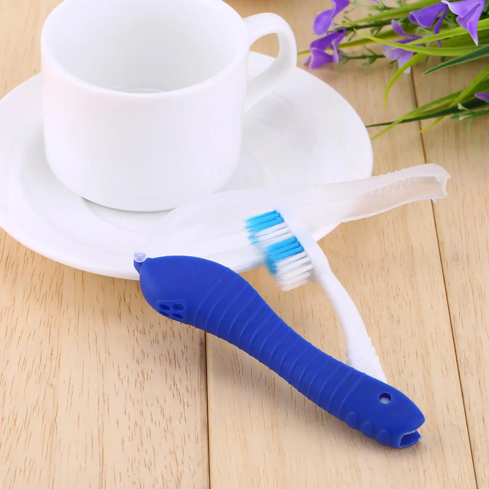 Portable Dark Blue Folding Toothbrush for Camping and Hiking - Compact Design for Adults on the Go - Dental Hygiene Tool