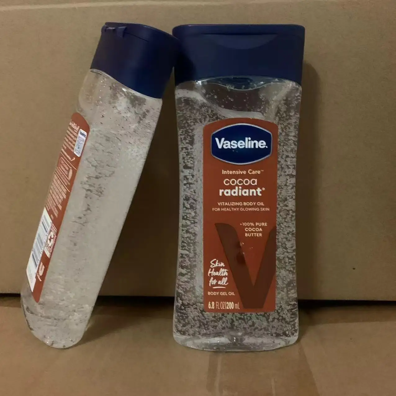 Vaseline Kakao Körper leuchtendes Öl 200 ml langanhaltendes feuchtigkeitsspendendes Hautpflegeöl Körper aufhellendes Anti-Trocknungs-Essenz-Pflegeprodukt