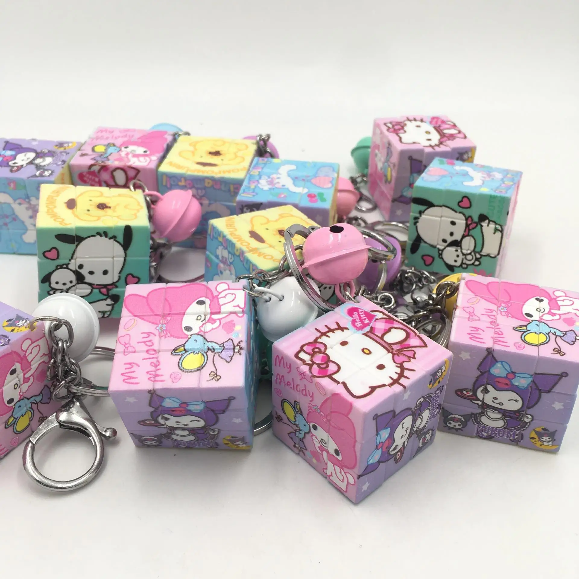 

1PCS Sanrio Magic Cube Keychain Kuromi Cinnamoroll Pochacco Melody Hello Kitty Bell Accessories Pendant for Kids Girl Gift