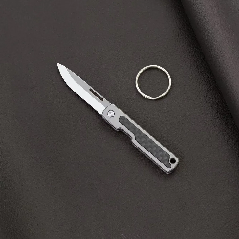 Titanium alloy mini EDC folding knife keychain for unboxing and express delivery, portable outdoor pocket folding knife
