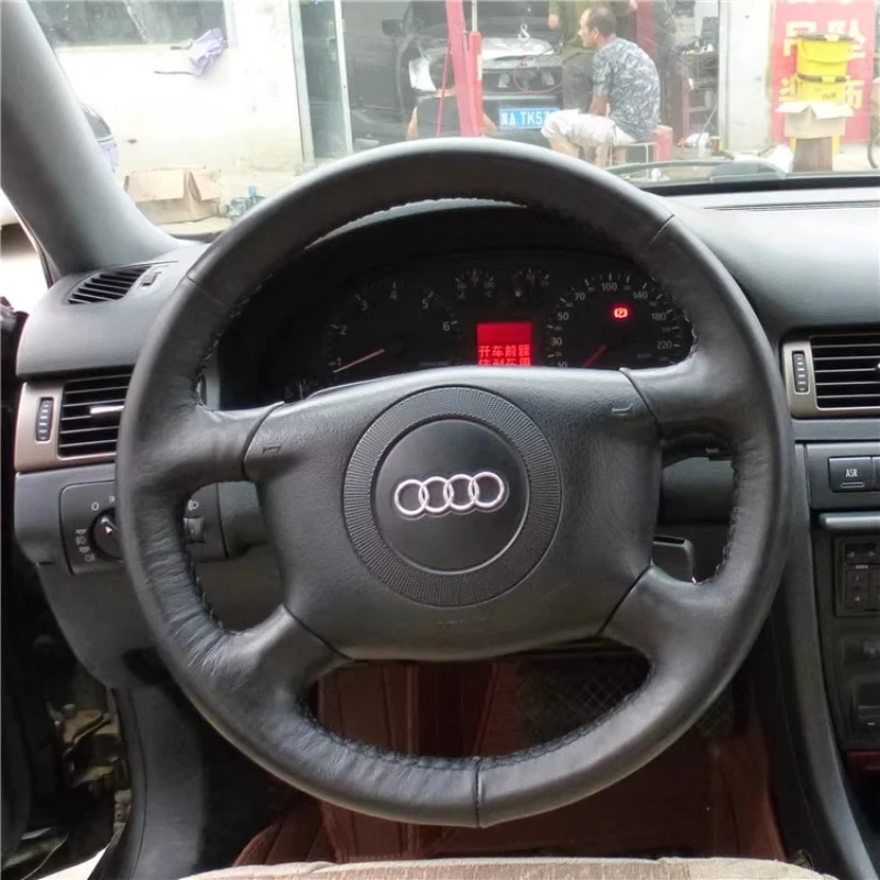 

Для Audi A2 (8Z) A6 (C5) Avant A8 (D2) S4 2003-2005 прошитый вручную белый чехол на руль из натуральной кожи