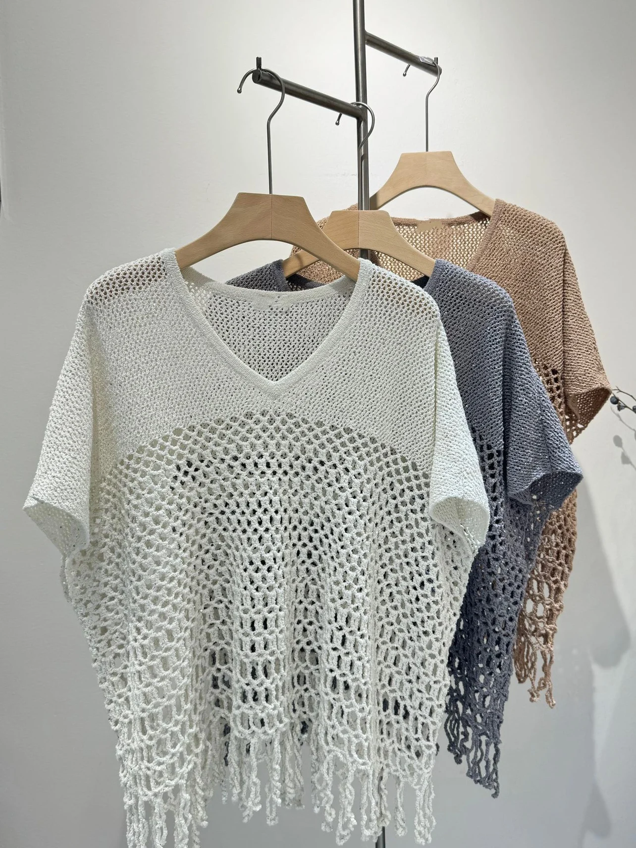 

Summer thin hollow V-neck linen solid color poncho with tassels decoration